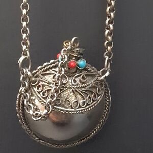Vintage Tibetan Silver Metal Pendant Snuff Necklace with Red/Turquoise Accents.
